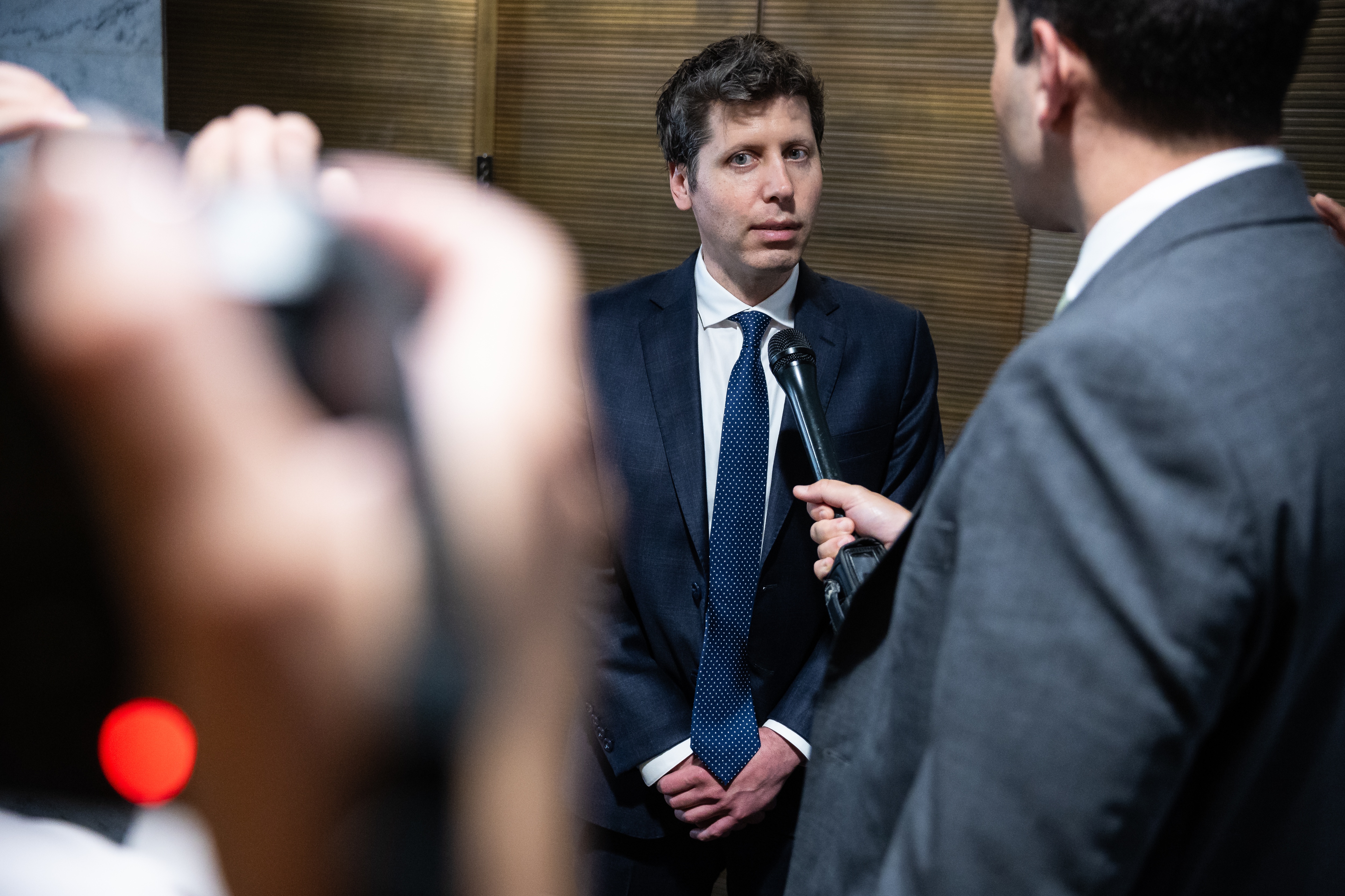 Altman Shows New AI Model to Lawmakers as Security Questions Mount